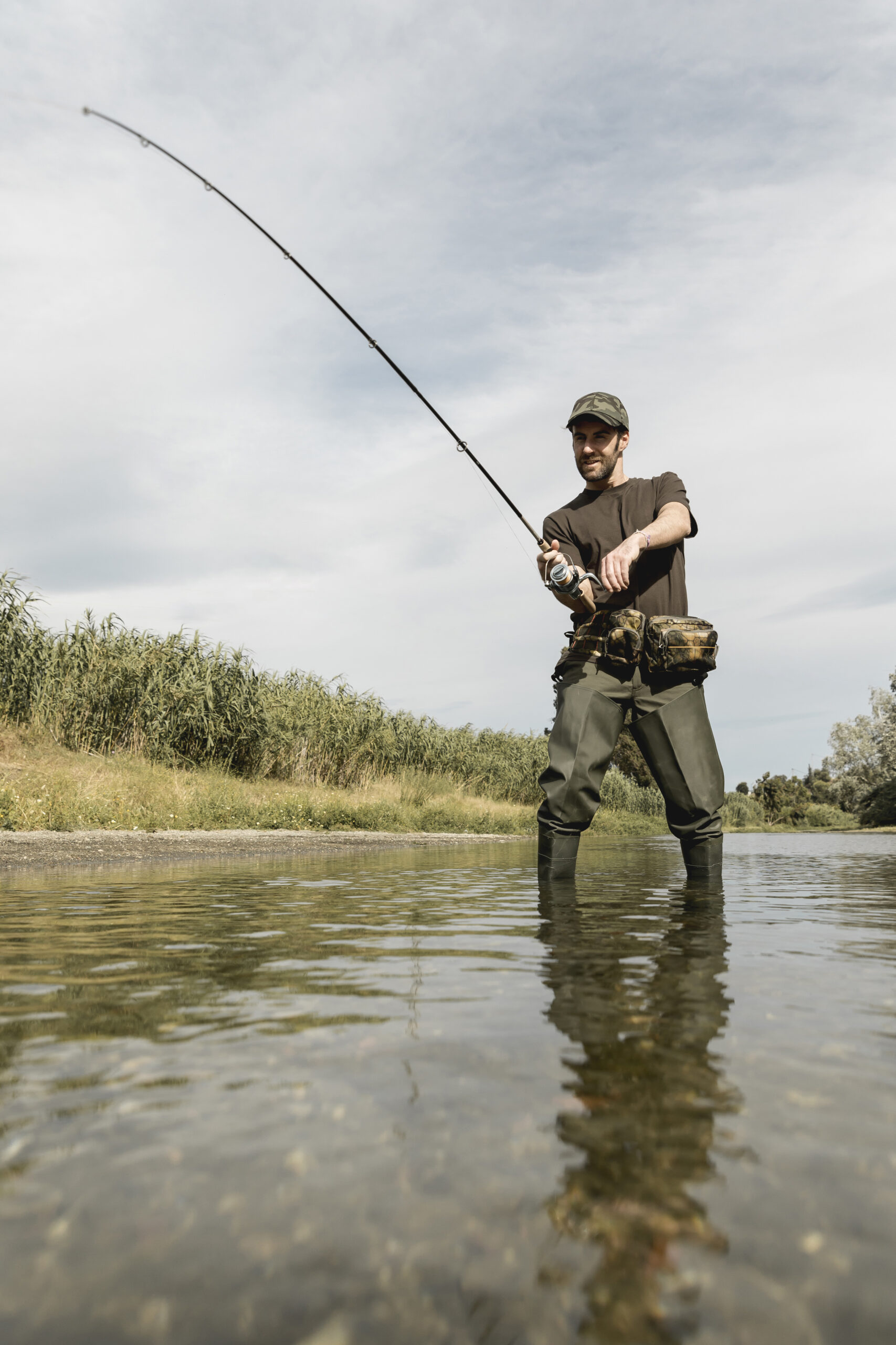 man-fishing-river